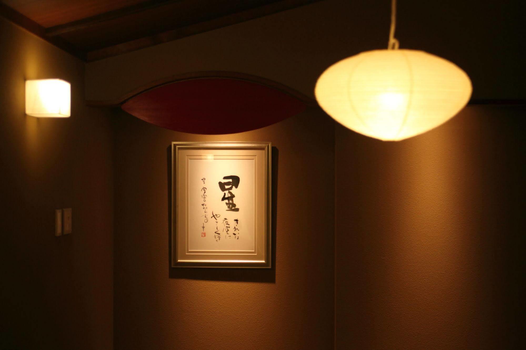 Amane Resort Seikai Beppu Eksteriør bilde A Japanese room with a Japanese paper lamp